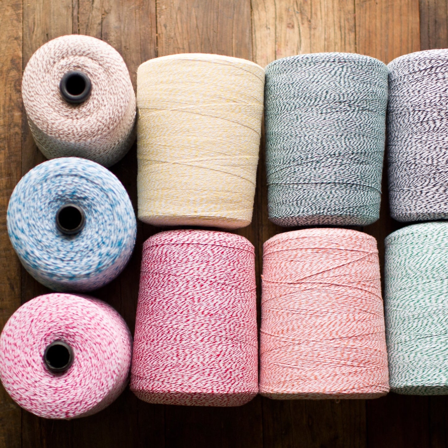 2 pound cones of striped bakers twine in a rainbow of colors for crafts and packaging