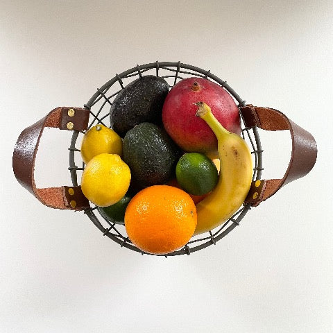 woven iron metal round fruit basket with cognac brown leather handles