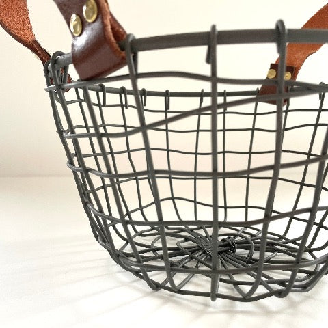 woven iron metal round fruit basket with cognac brown leather handles