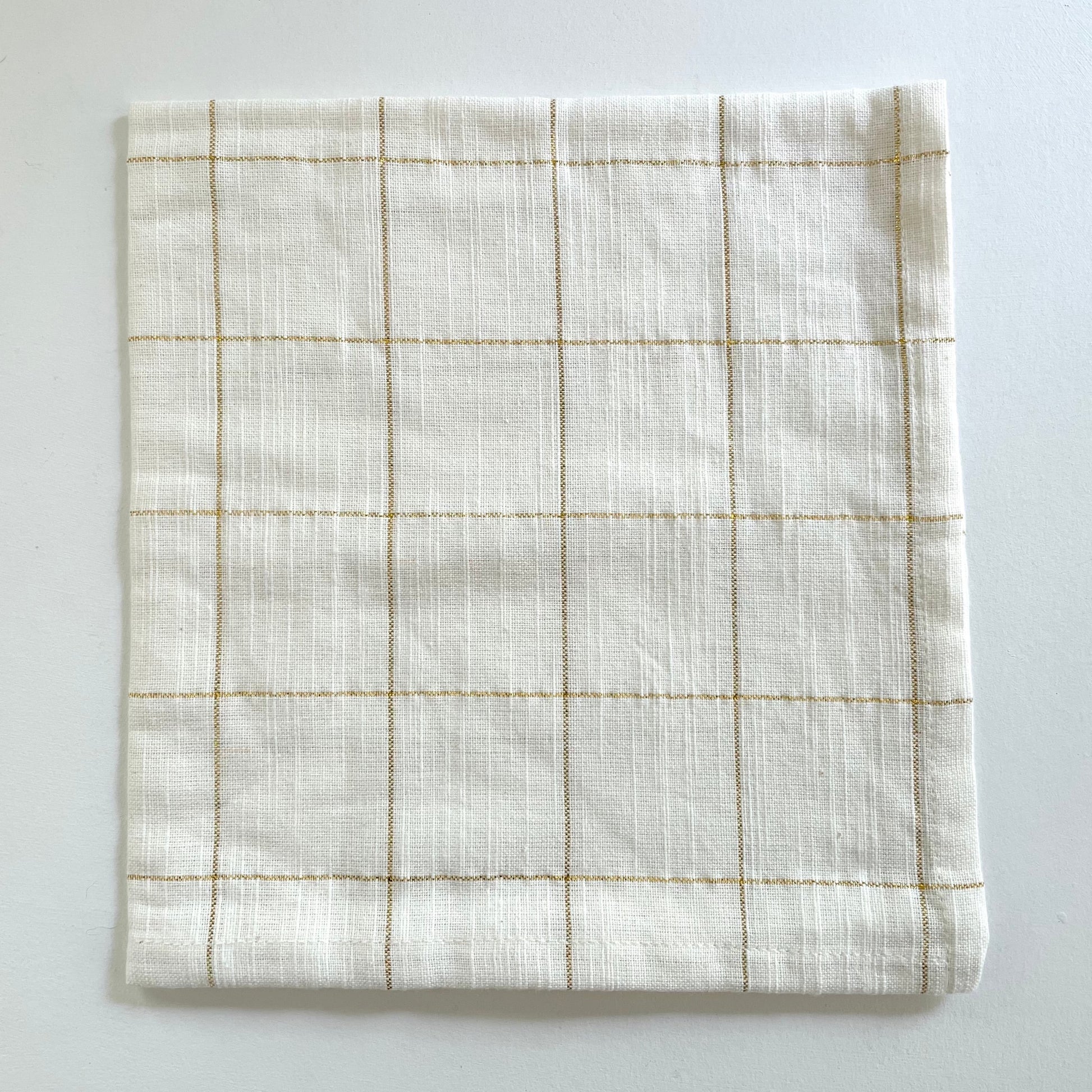 100 percent cotton cream 18x18 table dinner napkins with gold grid pattern