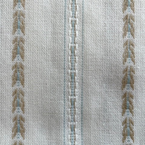 100 percent cotton cream 18x18 table dinner napkins with tan and blue pattern