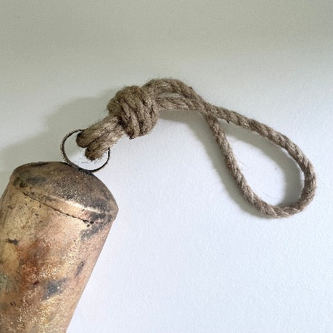 5 inch tin bell with brass finish wood striker and jute hanger