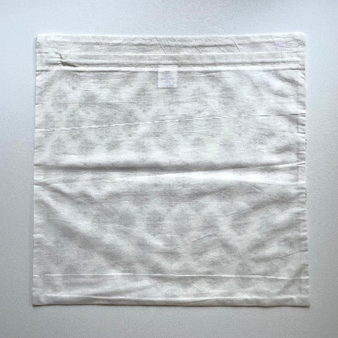 neutral peach and greenish grey floral with stem block printed 100 percent cotton 18x18 square pillow cover