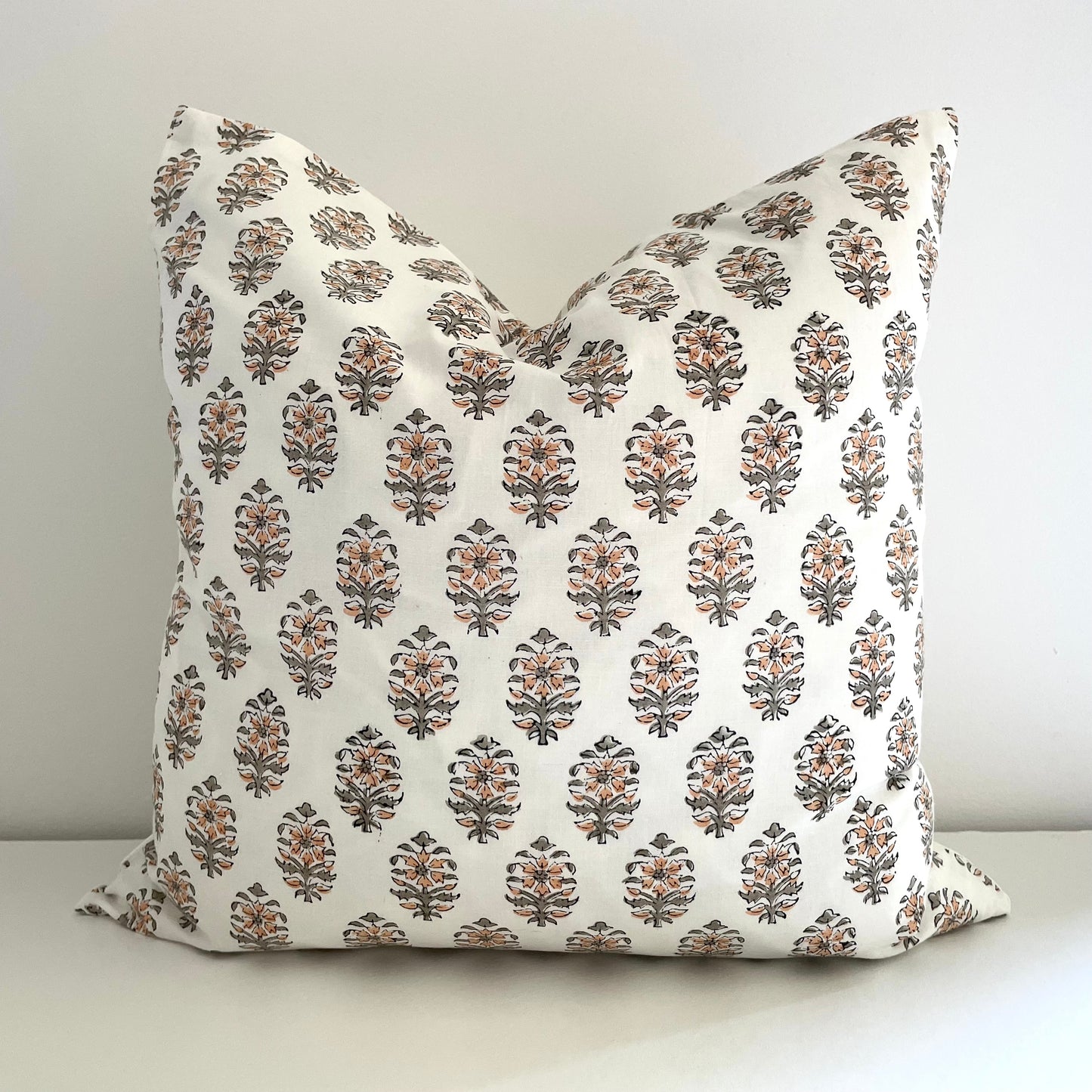 neutral peach and greenish grey floral with stem block printed 100 percent cotton 18x18 square pillow cover