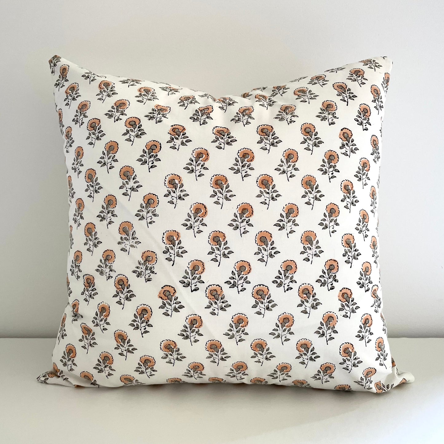 neutral peach and greenish grey floral buds block printed 100 percent cotton 18x18 square pillow cover