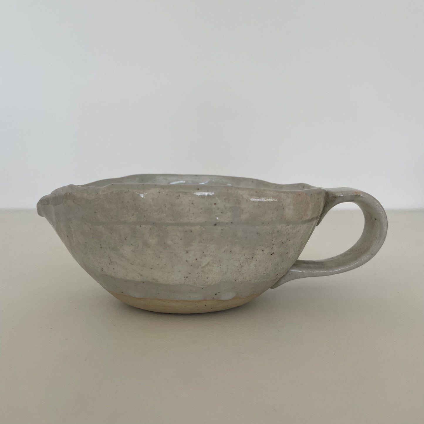 cream and grey gohonte handmade Japanese ceramic pottery small round pitcher, syrup pourer, gravy boat