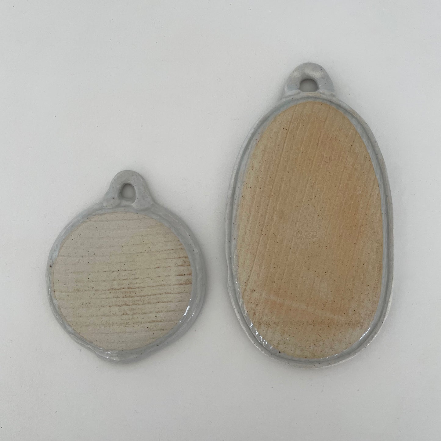 neutral grey and cream gohonte handmade ceramic pottery Japanese round and oval food graters with handle