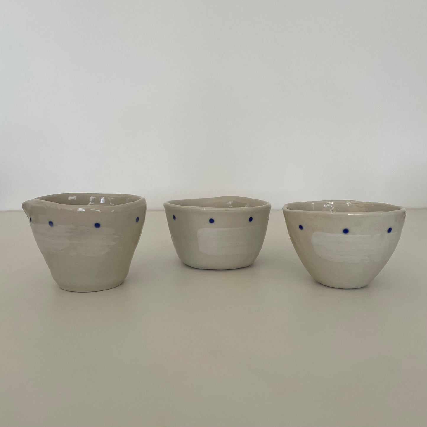 cream and blue dot handmade Japanese ceramic small mini pitcher, bowl, and cup