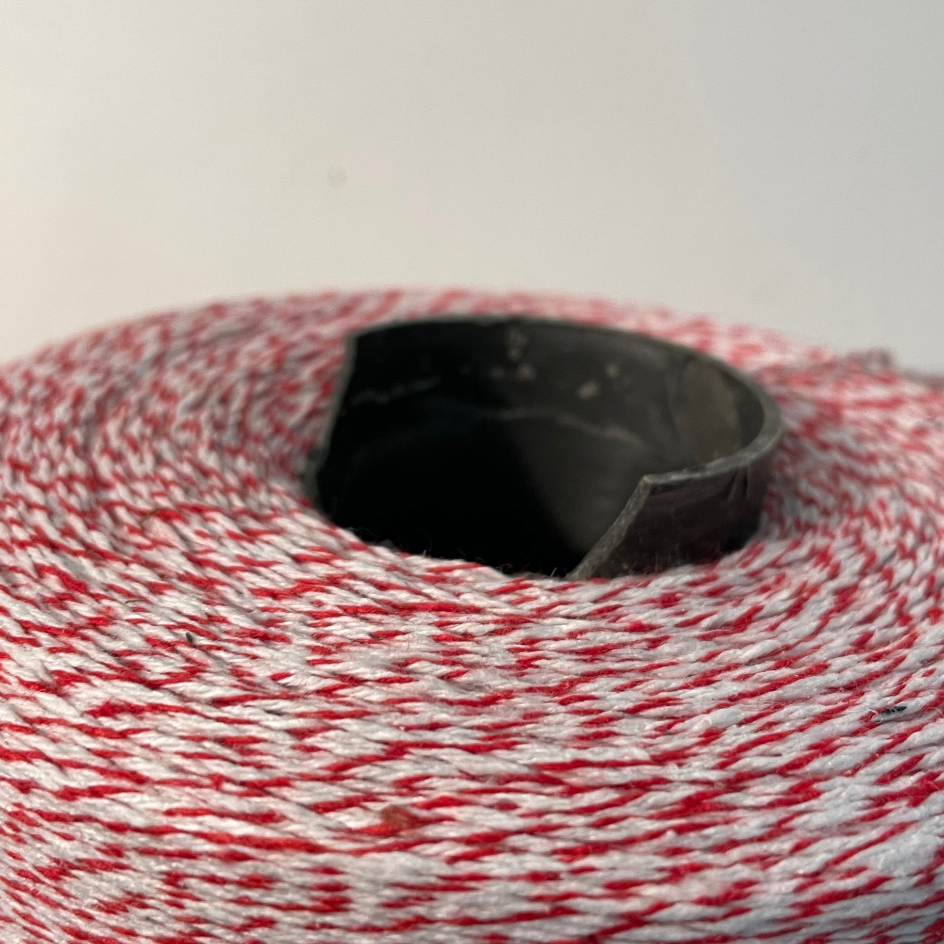 ed and white striped bakers twine bulk 2 pound cone for crafts and packaging closeup of broken plastic cone
