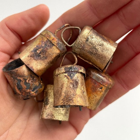 1 1/2 inch tiny flat top tin bells with brass finish and a metal striker