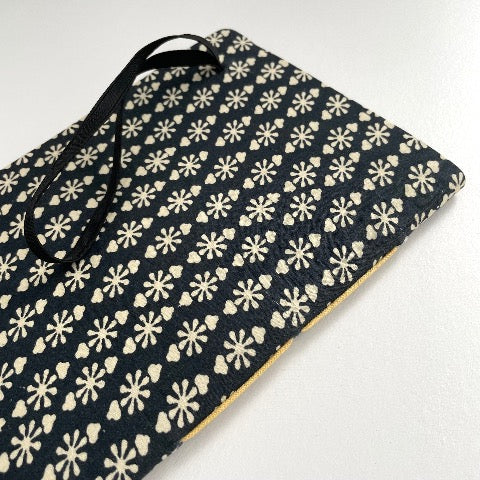 neutral black, cream, and blue fabric covered handmade unlined notebook journal