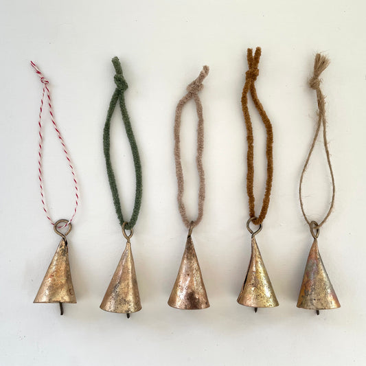 tiny 2 inch cone shaped tin bells with brass finish Christmas holiday ornaments on suede cord twine and jute