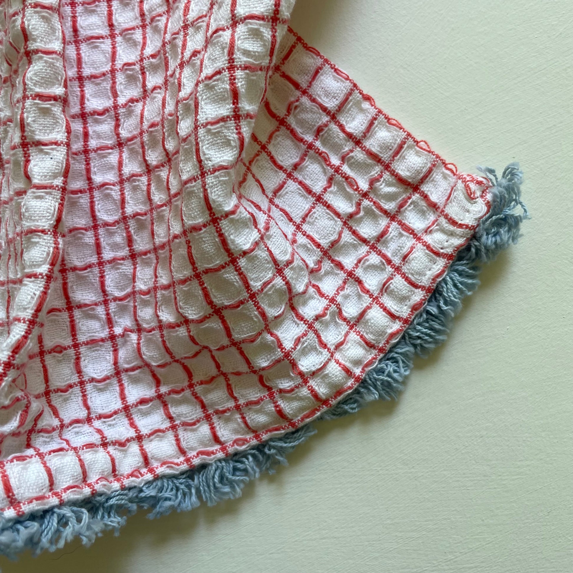 100 cotton waffle kitchen dishcloths with fringe in red with blue fringe