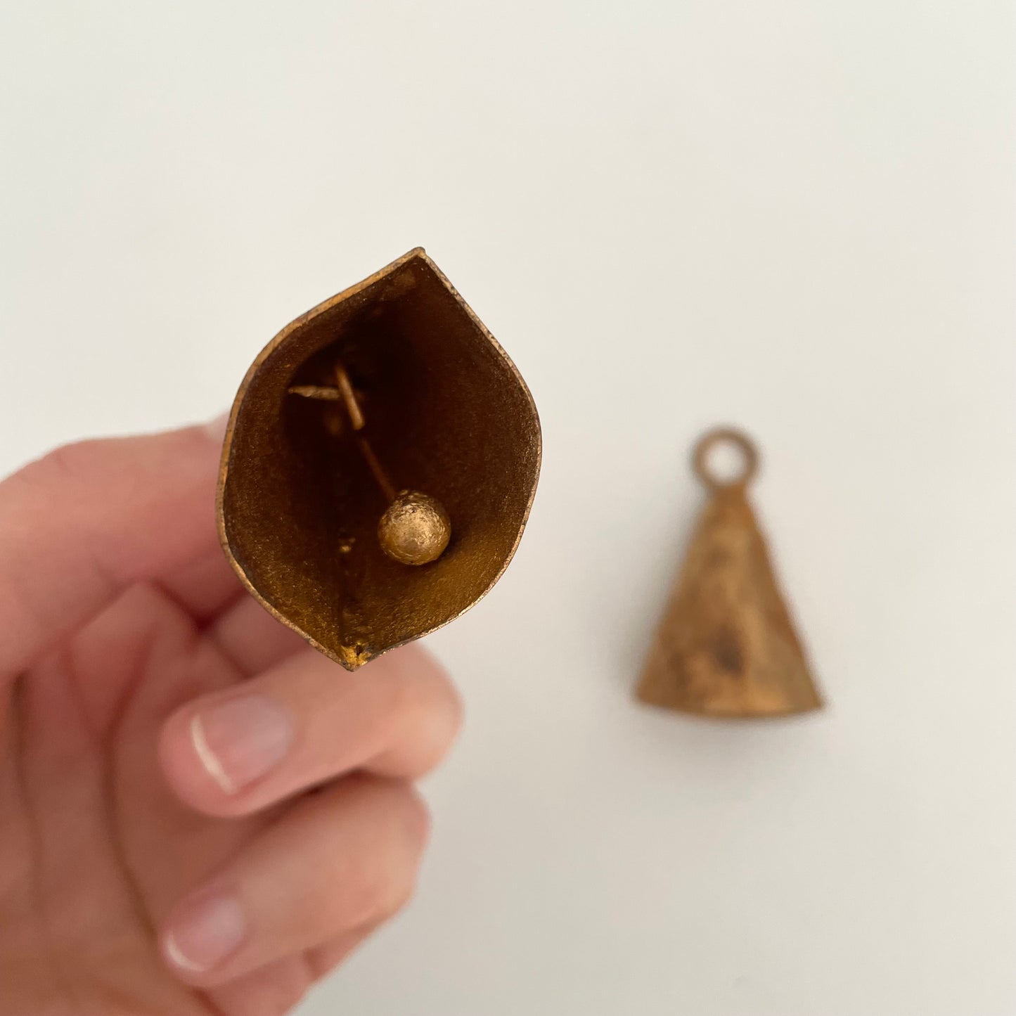 arch cone shaped tin bell with brass finish and metal striker handmade in India
