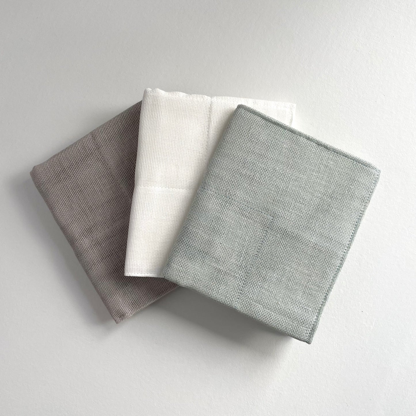 100 percent cotton mosquito net caya Japanese kitchen cloth in grey, white, tan, and celadon green