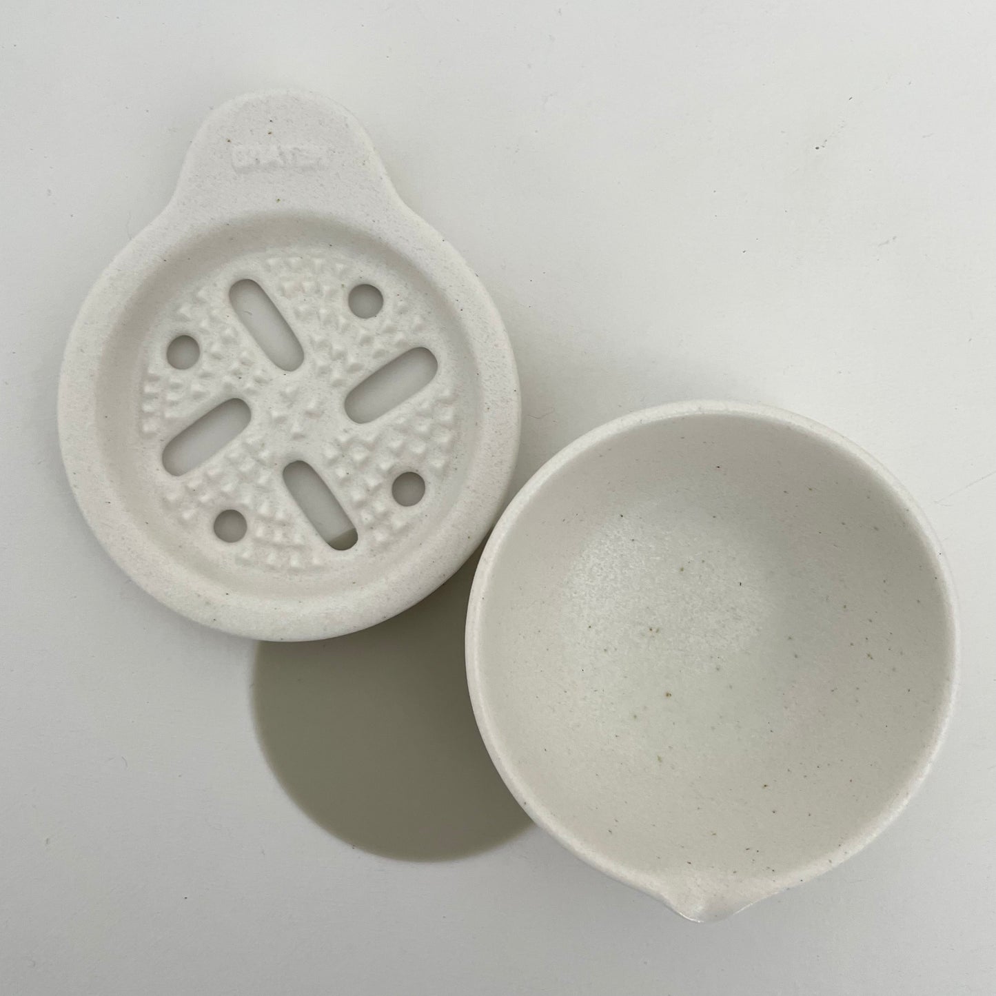 white porcelain ceramic Japanese vegetable grater