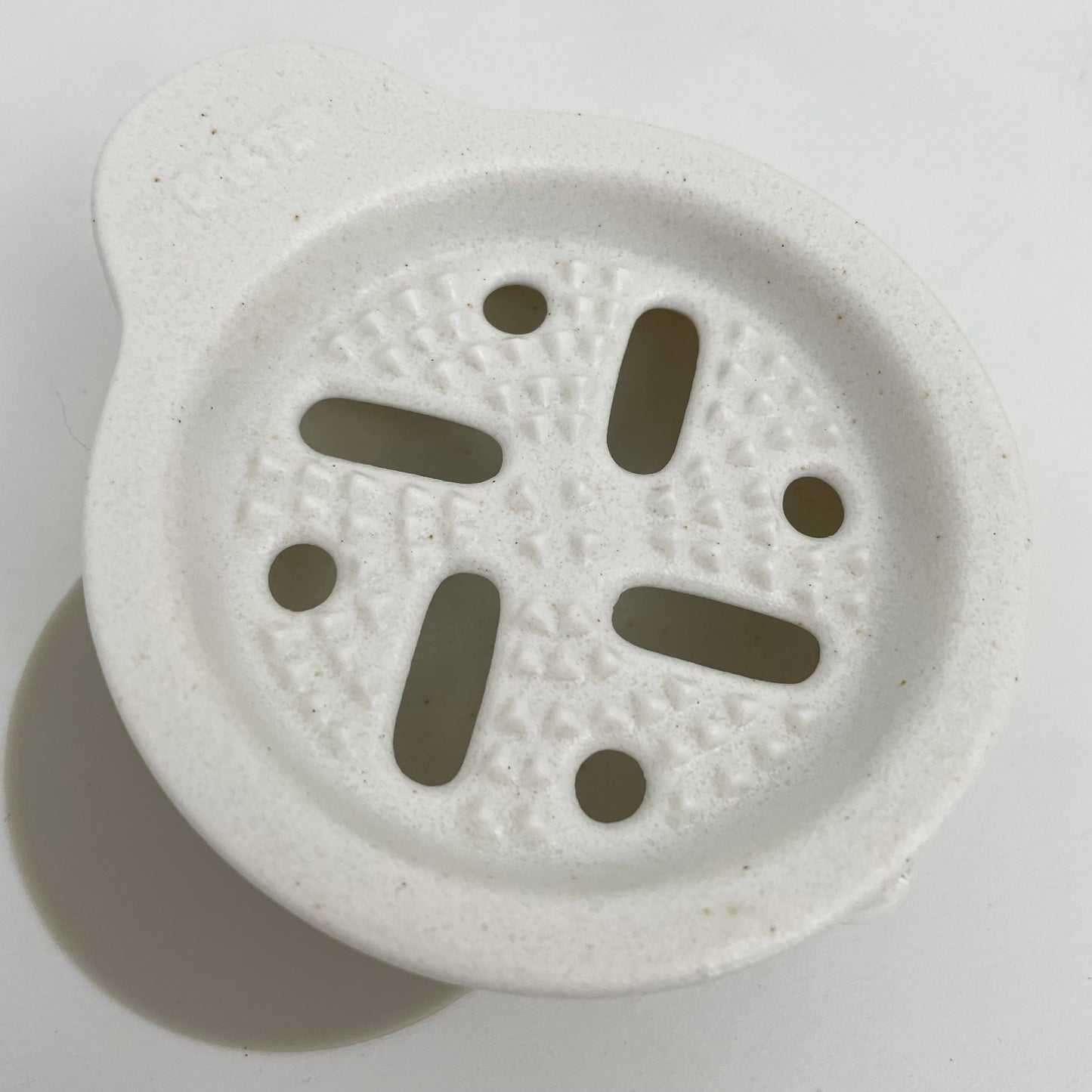 white porcelain ceramic Japanese vegetable grater