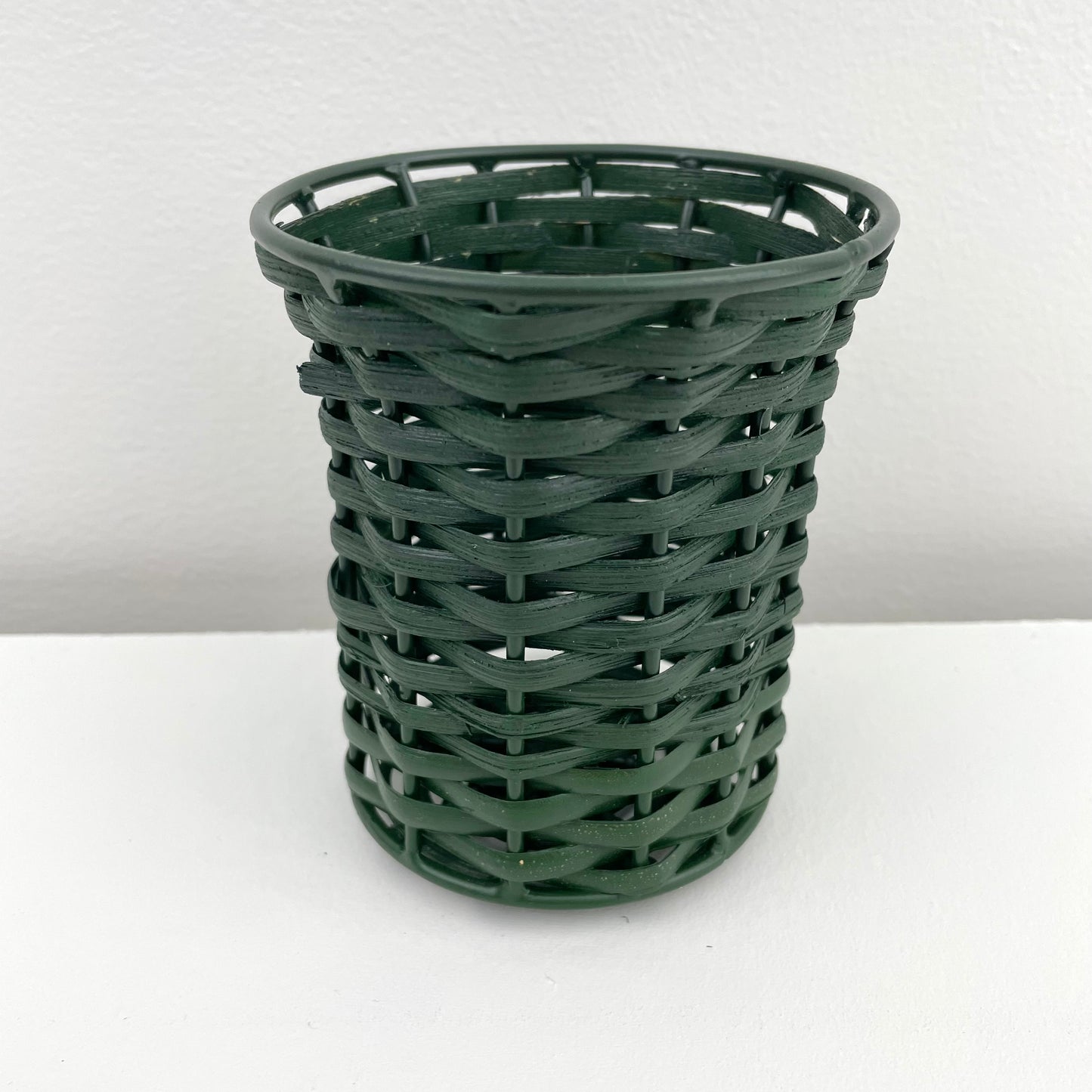 hunter green cane and iron woven pencil and pen holder