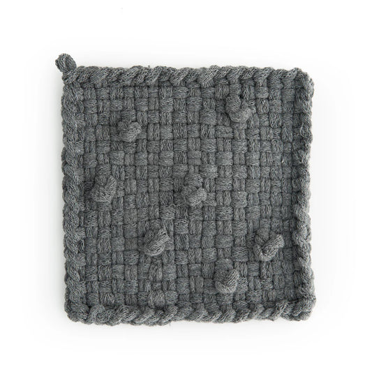 grey handmade 100 percent cotton bobble woven potholder or trivet for a farmhouse kitchen