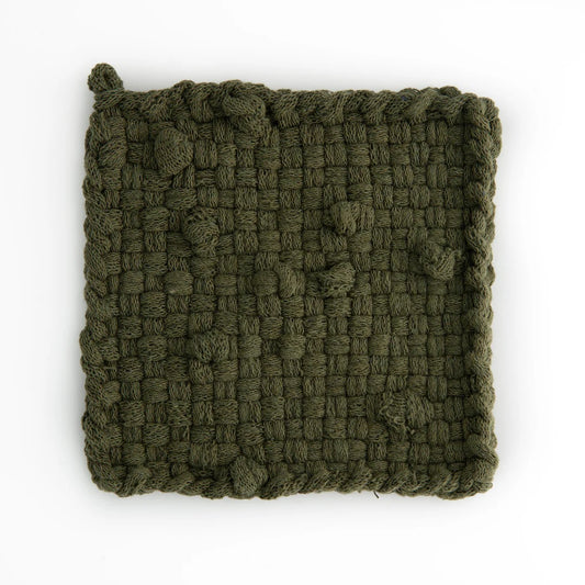 green handmade 100 percent cotton bobble woven potholder or trivet for a farmhouse kitchen