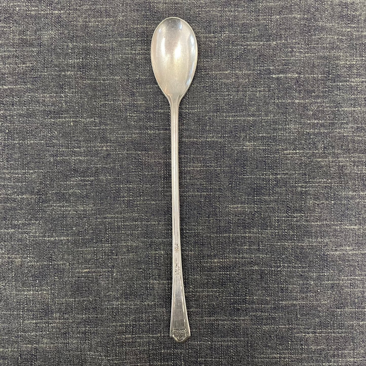 antique silver long handled teaspoon for serving jam or prop photography