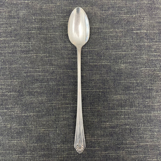 antique silver long handled teaspoon for serving jam or prop photography