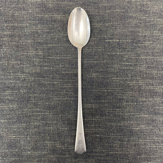 antique silver long handled teaspoon for serving jam or prop photography