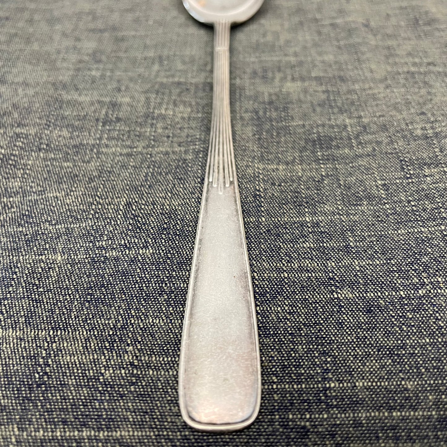 antique silver long handled teaspoon for serving jam or prop photography