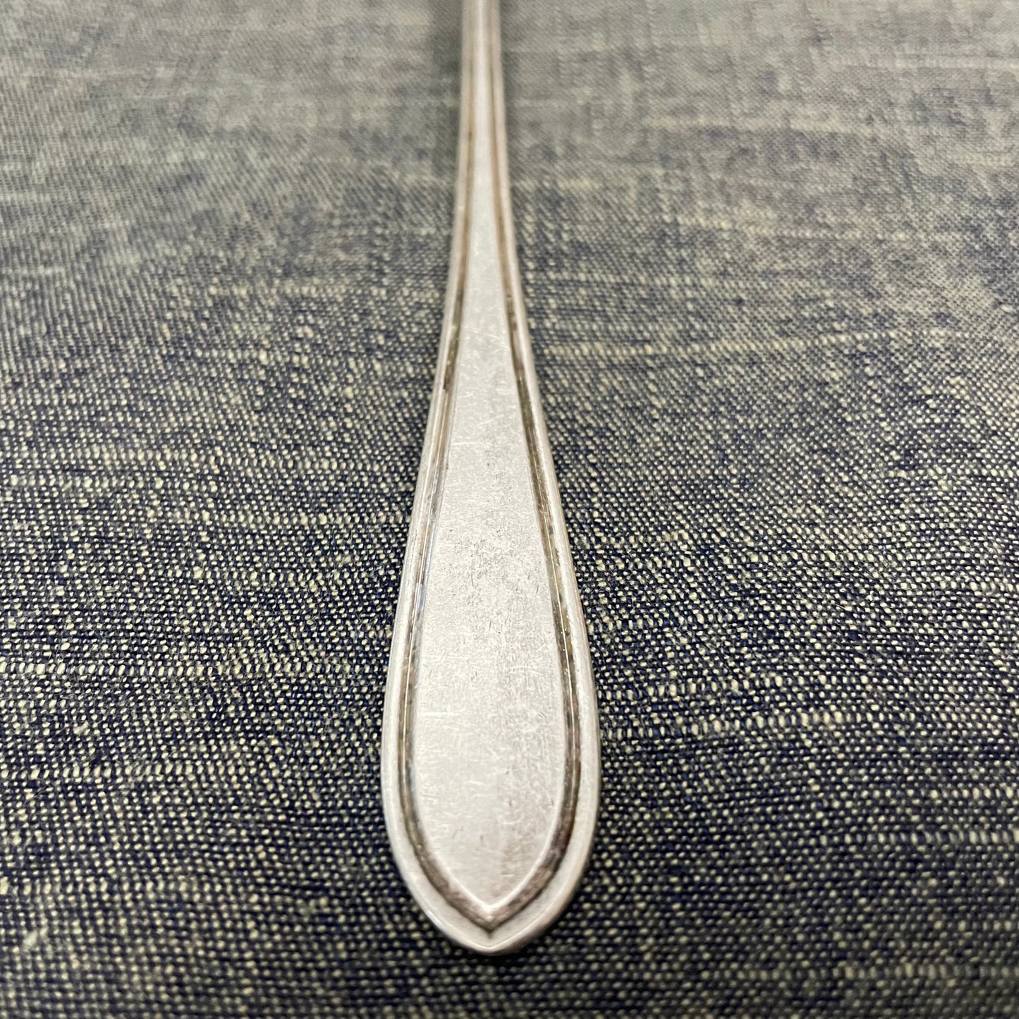 antique silver long handled teaspoon for serving jam or prop photography