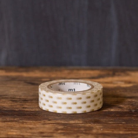 gold and white polka dot printed MT Brand Japanese washi tape roll