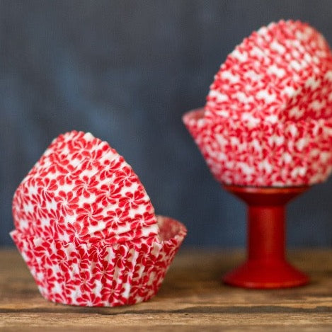 red and white pinwheel flower printed paper cupcake liners party supplies