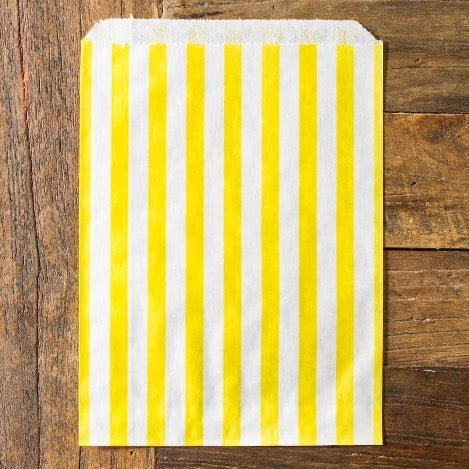 yellow and white striped candy, treat, or gift bags for circus party