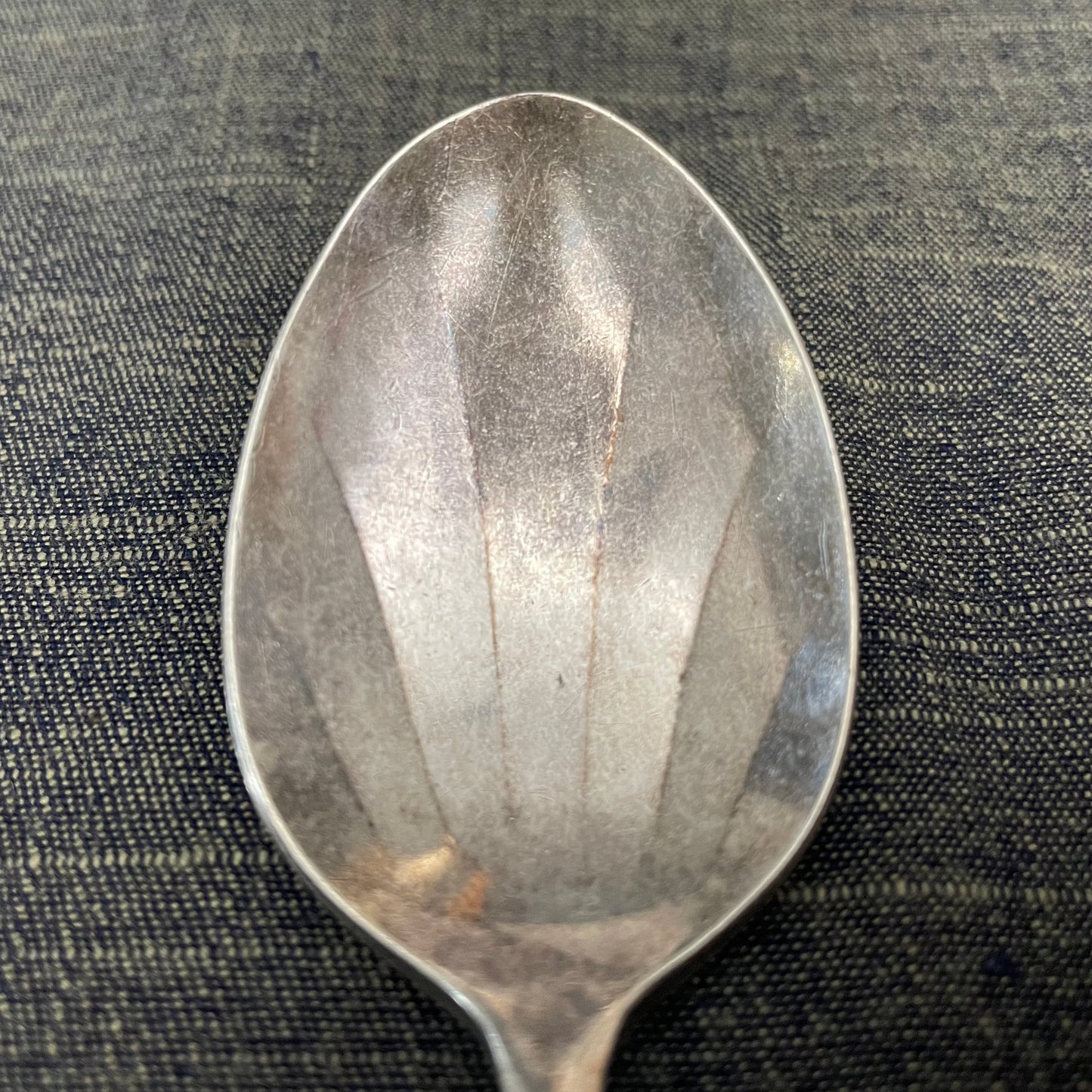 antique silver small serving spoon for serving or prop photography
