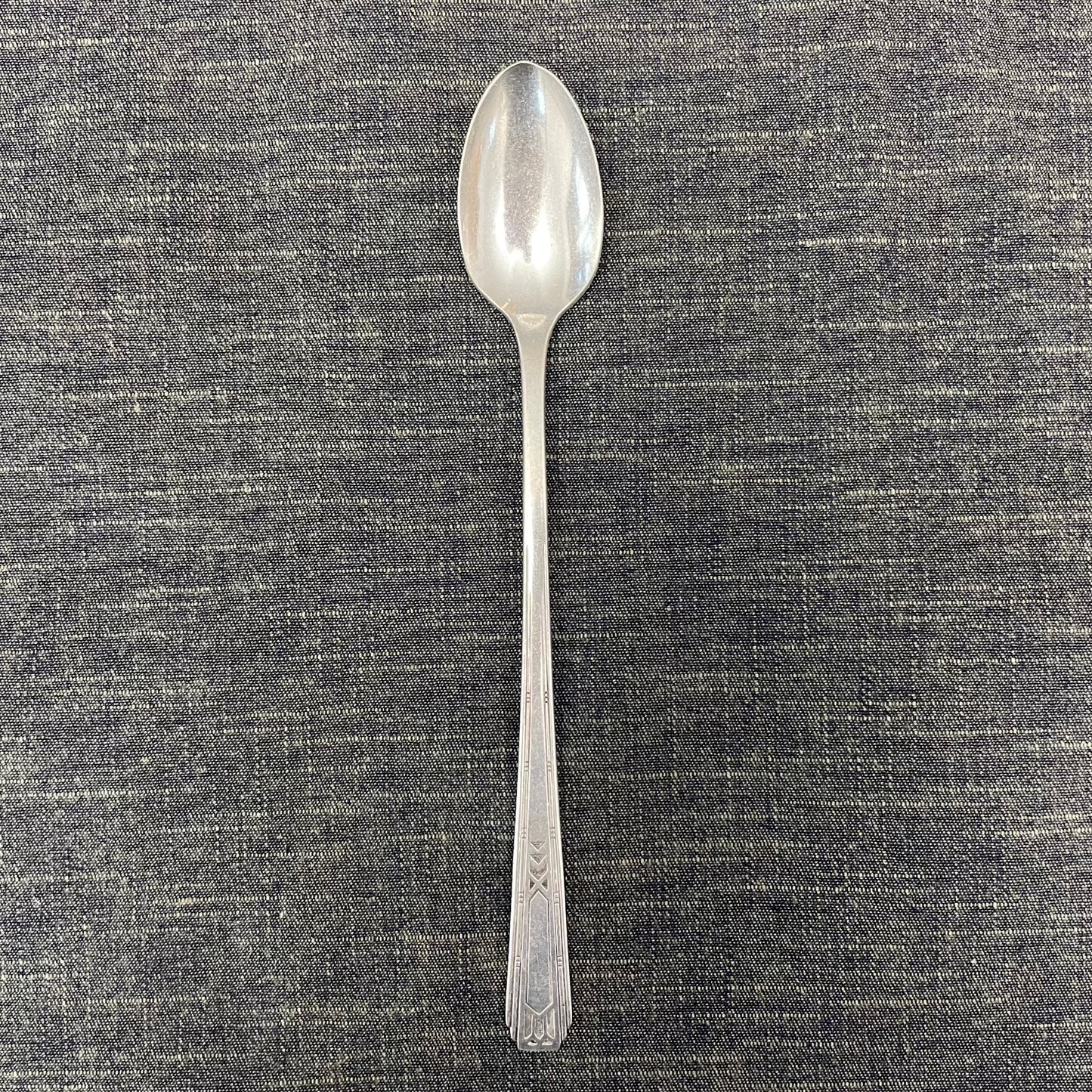 antique silver long handled teaspoon for serving jam or prop photography