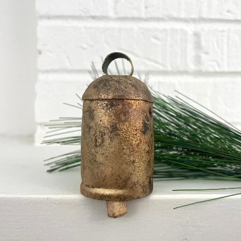 3 inch rustic tin bell with a brass finish and wood striker for an old world holiday decor