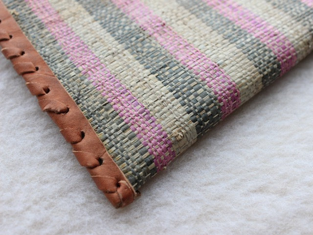 pink, green, and cream muted striped raffia woven zippered clutch with leather trim bohemian