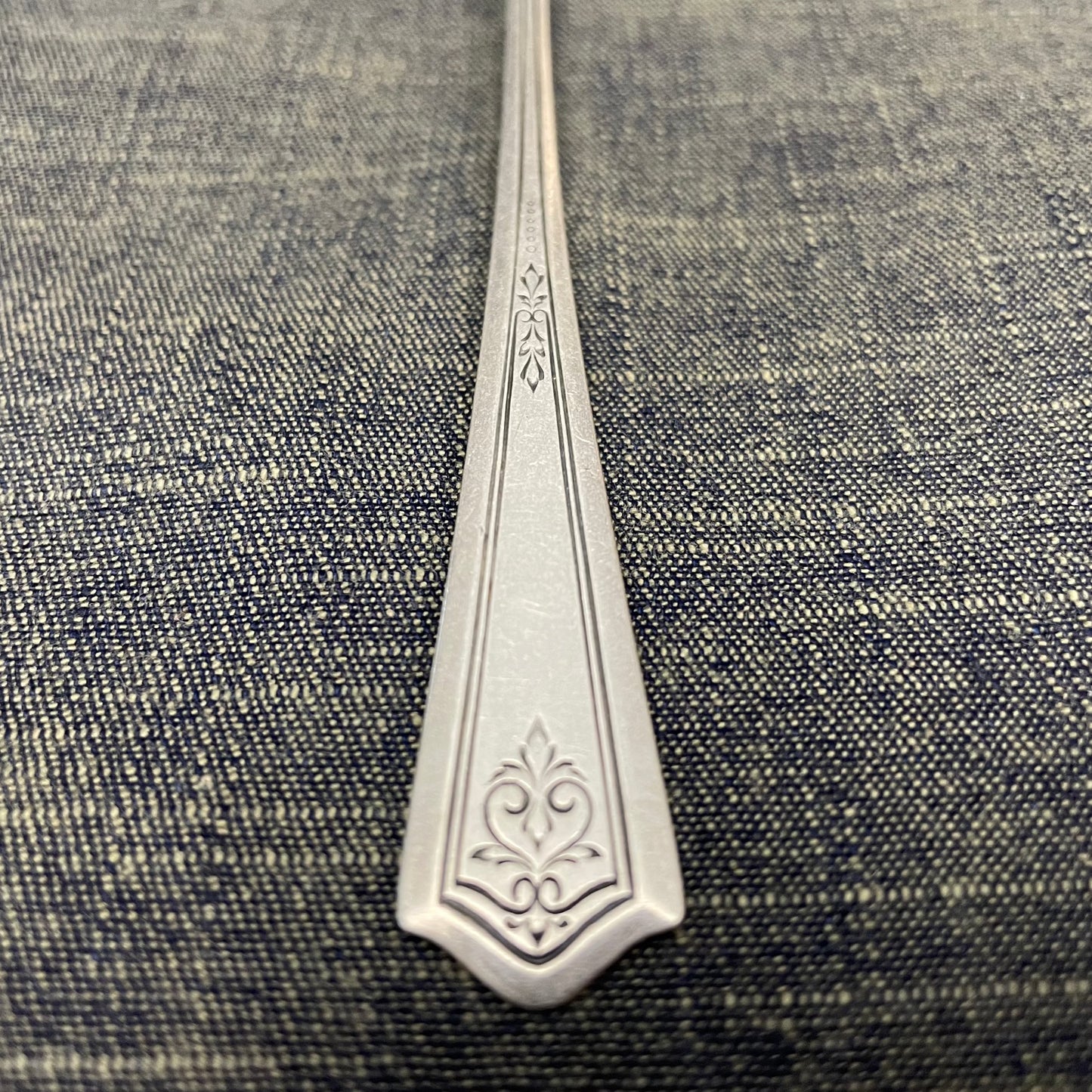 antique silver long handled teaspoon for serving jam or prop photography
