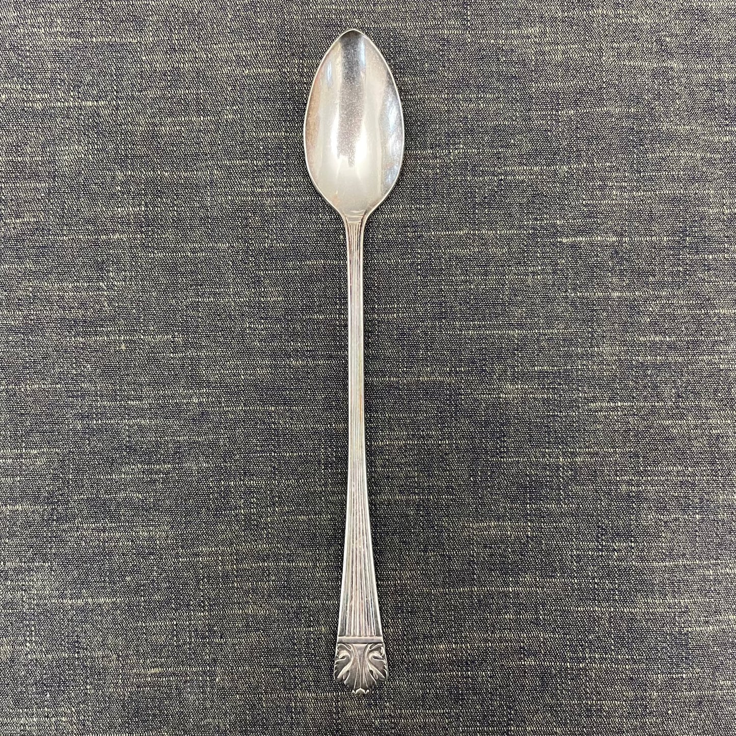 antique silver long handled teaspoon for serving jam or prop photography