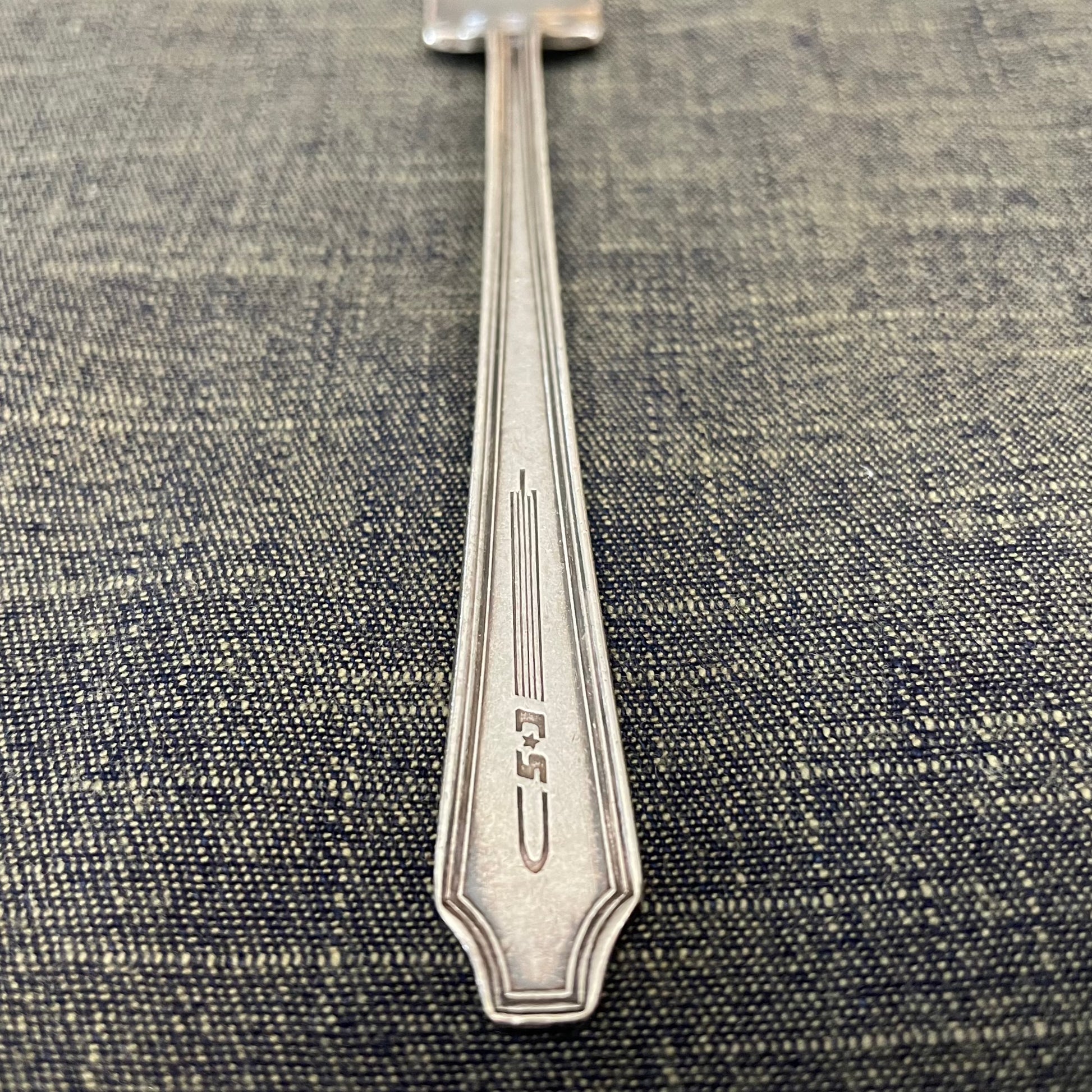 antique silver condiment server fork or prop photography