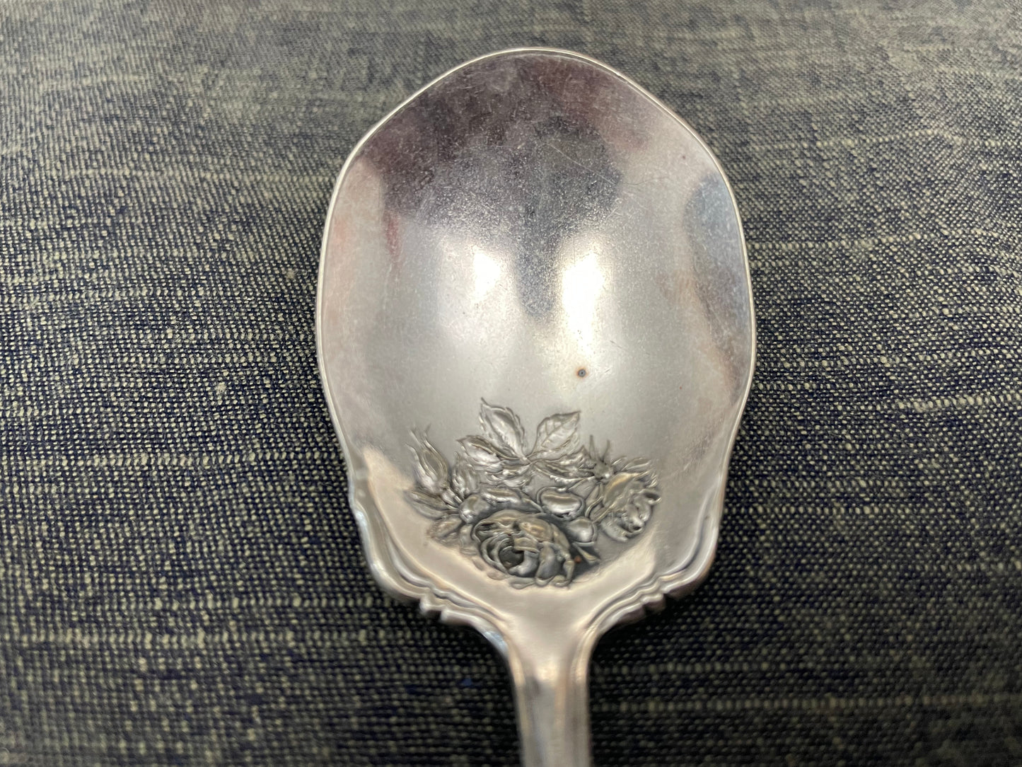 antique silver small serving spoon for serving or prop photography