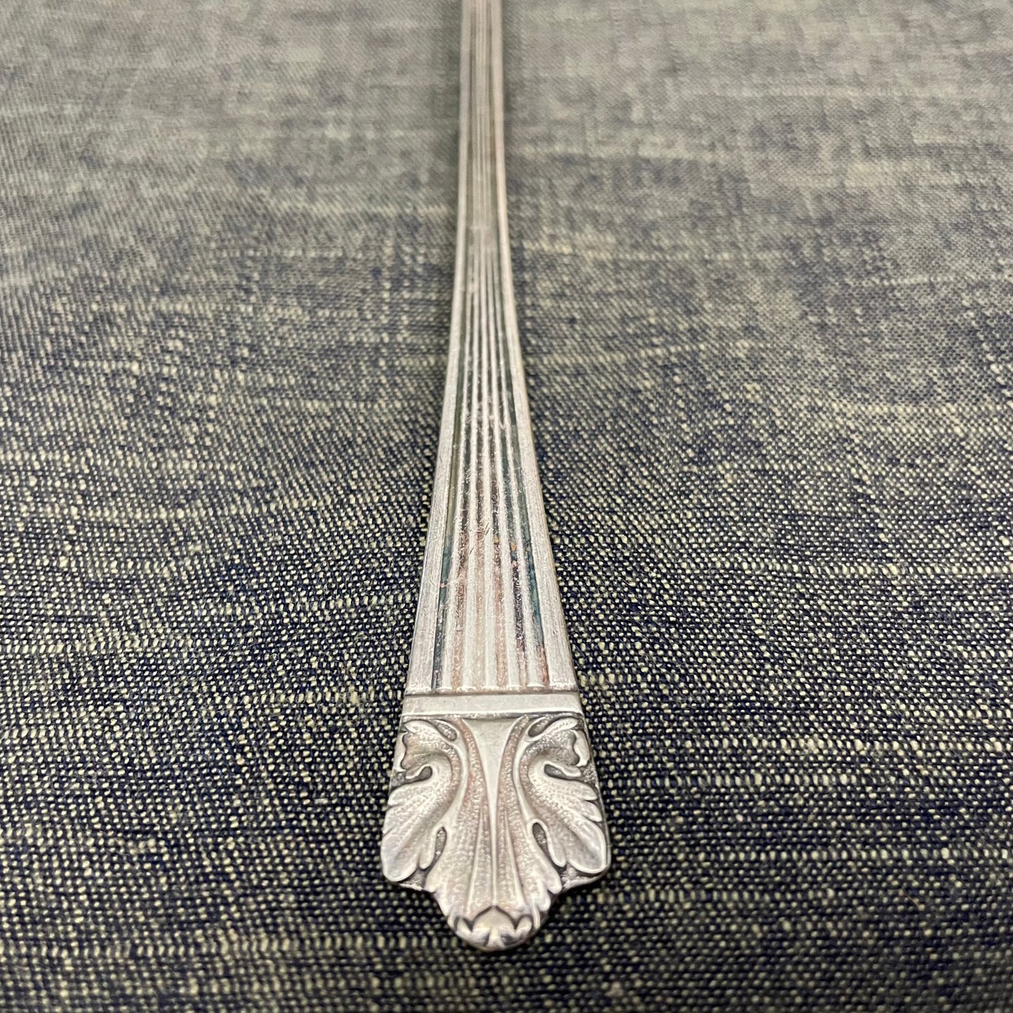 antique silver long handled teaspoon for serving jam or prop photography