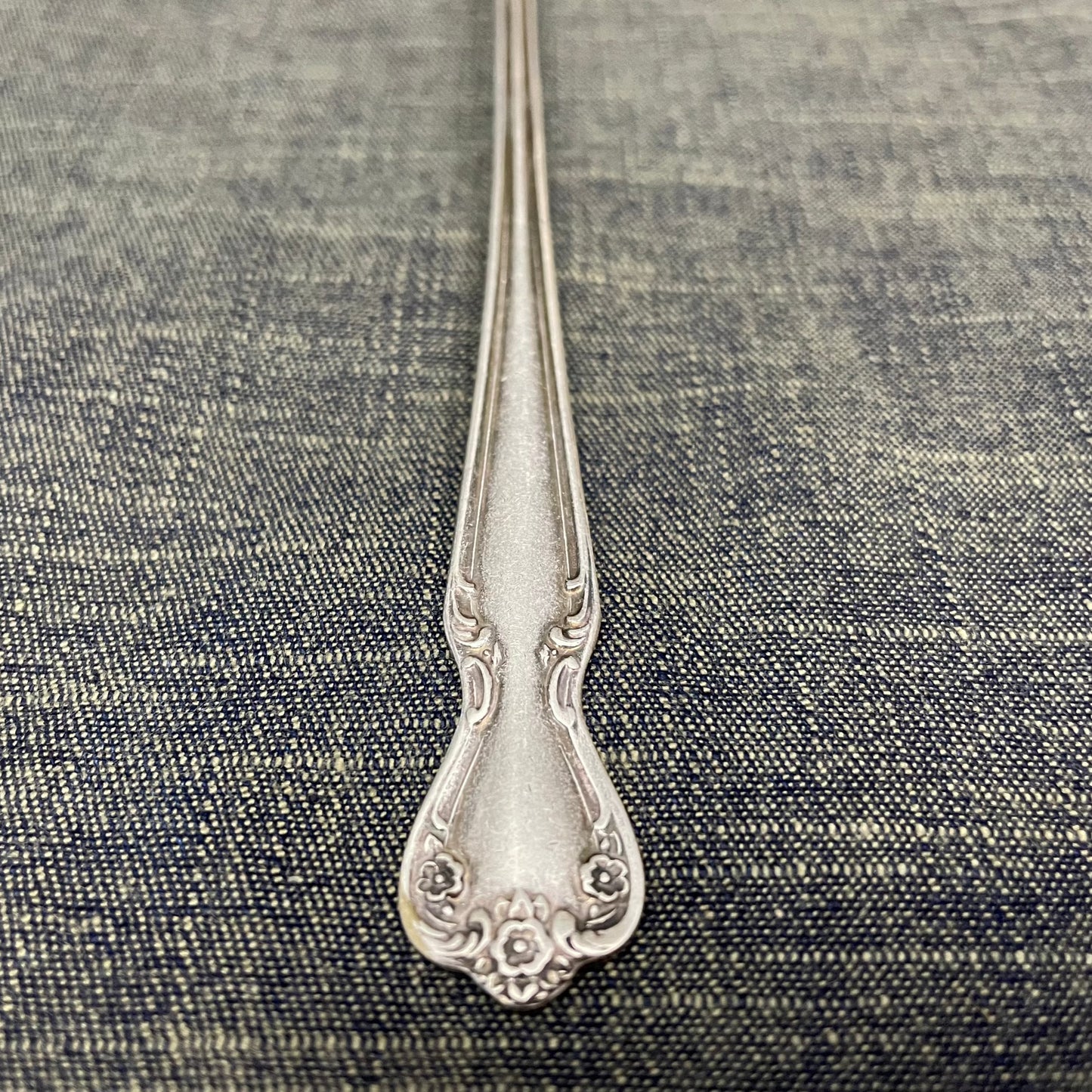 antique silver long handled teaspoon for serving jam or prop photography