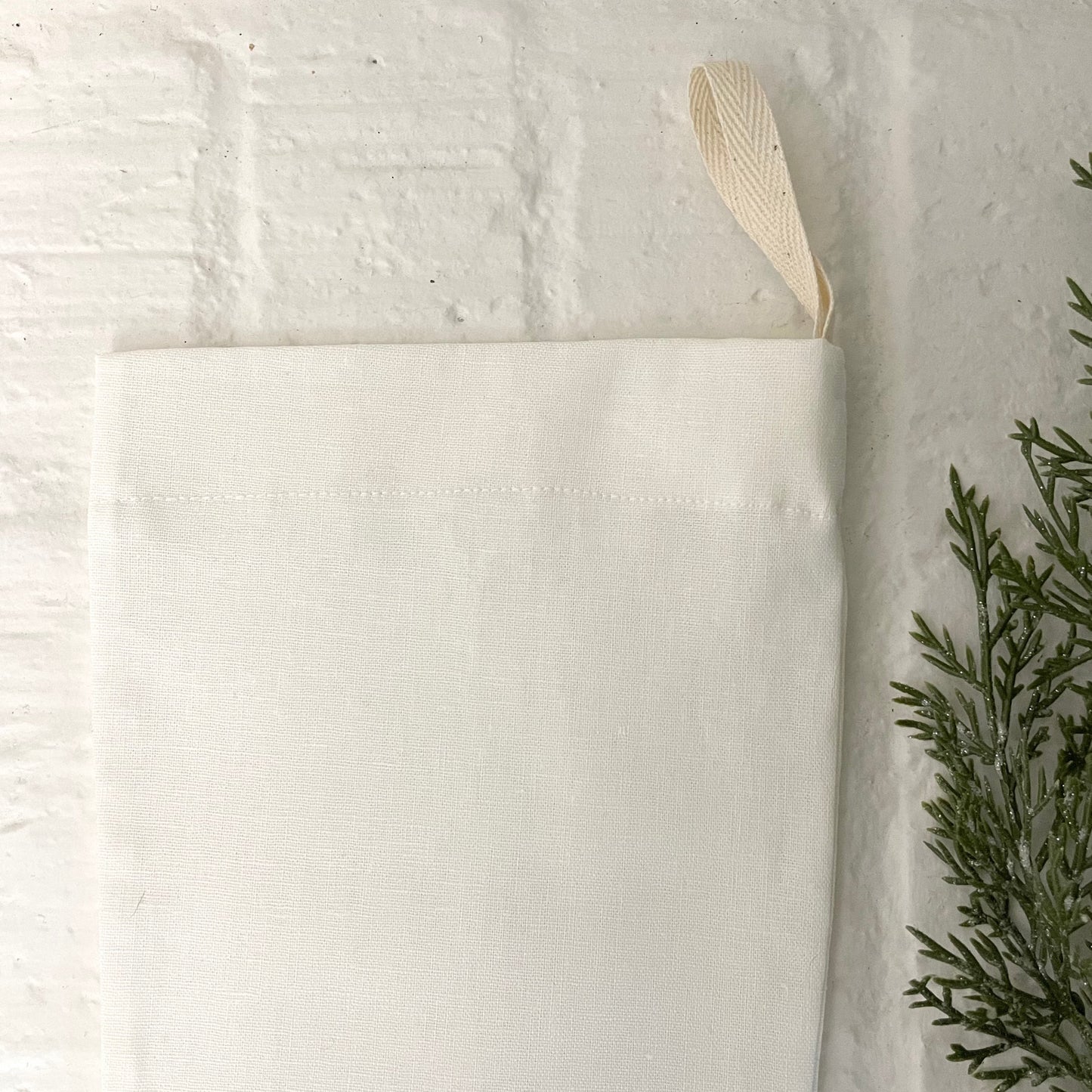 white linen handmade Christmas stocking