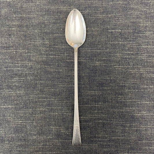 antique silver long handled teaspoon for serving jam or prop photography