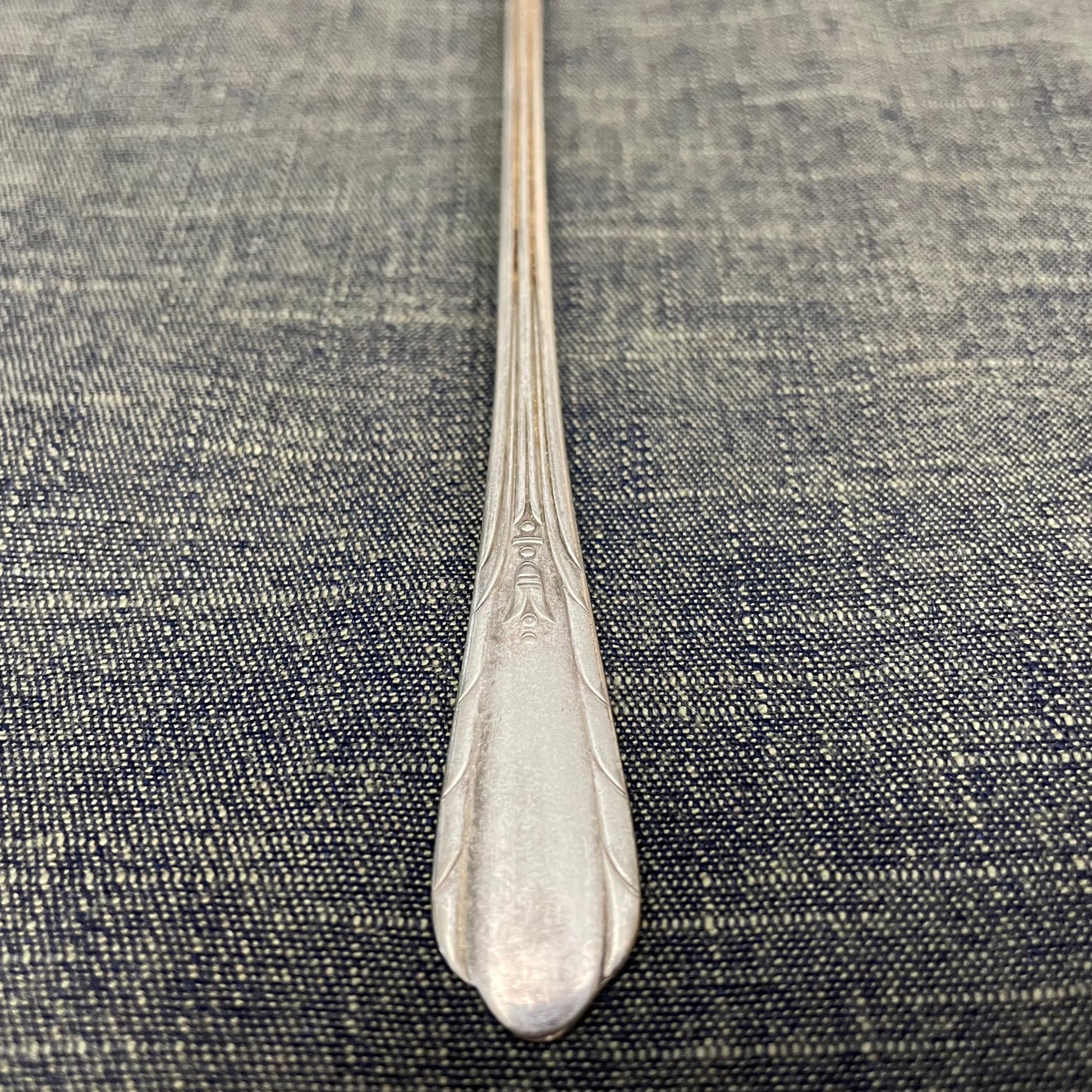 antique silver long handled teaspoon for serving jam or prop photography