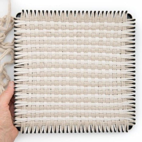 handmade 100 percent cotton gingham woven potholder or trivet on the loom