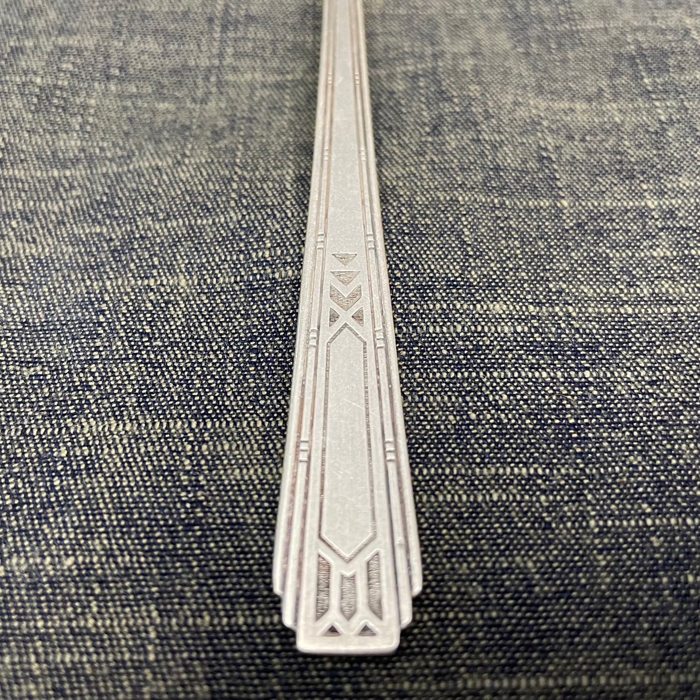 antique silver long handled teaspoon for serving jam or prop photography