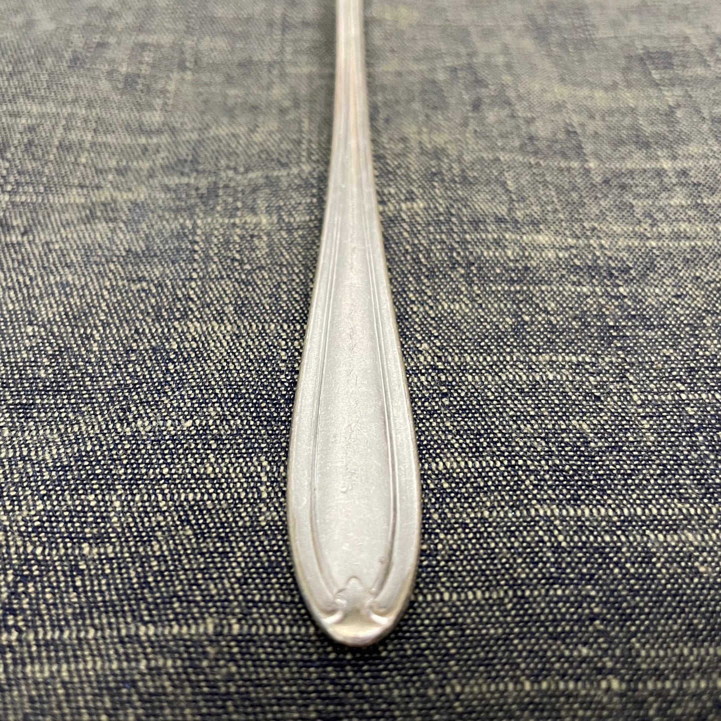 antique silver long handled teaspoon for serving jam or prop photography