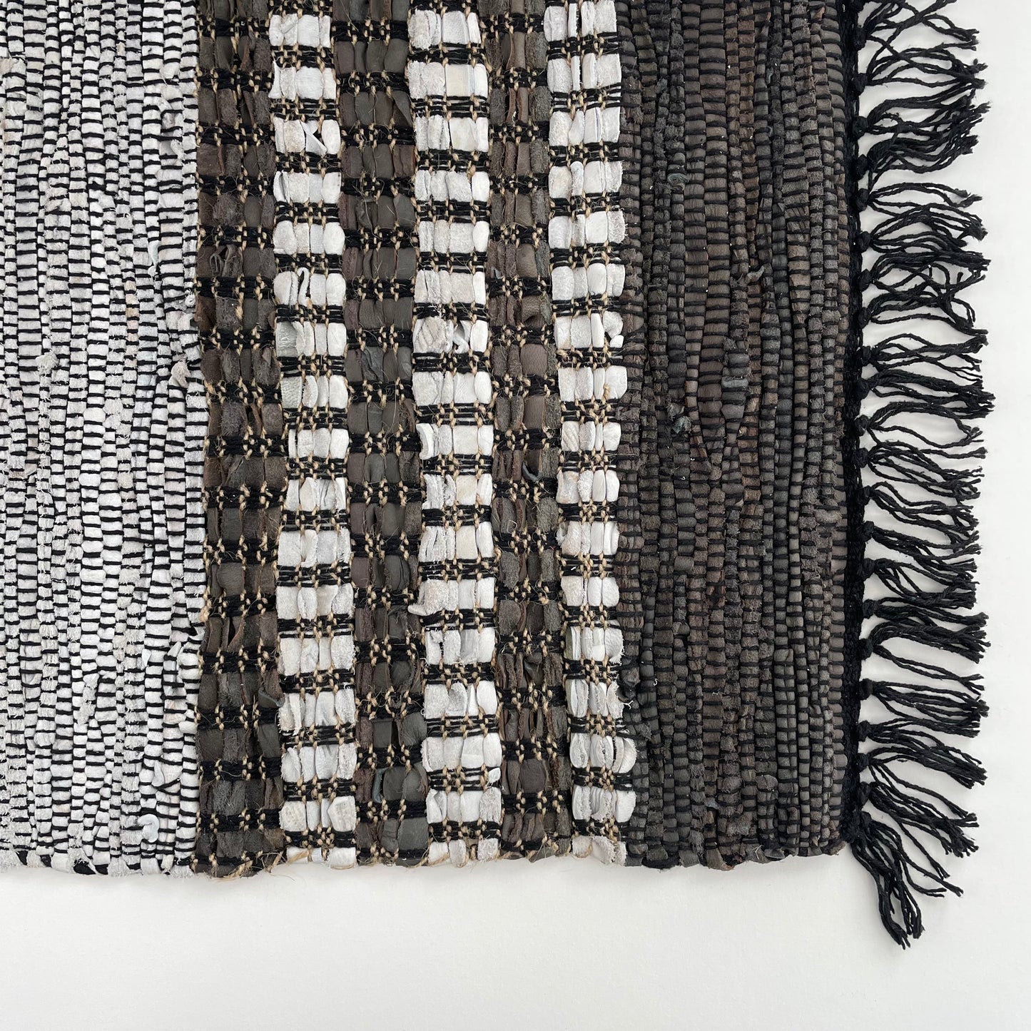 grey brown and black leather and jute striped 2x3 rug