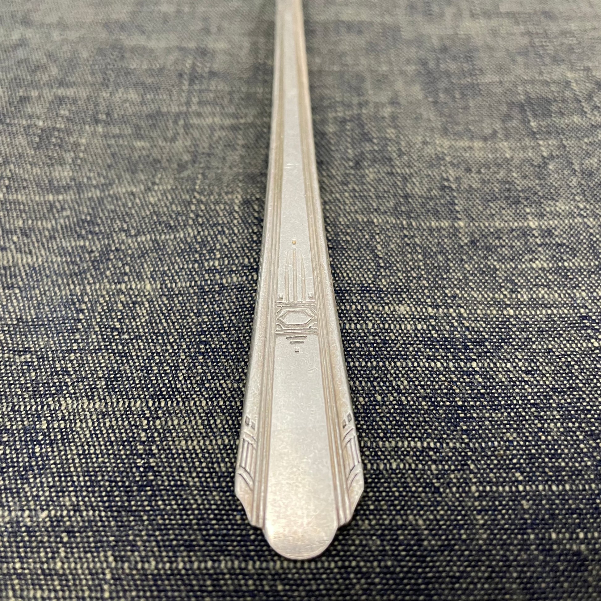 antique silver long handled teaspoon for serving jam or prop photography